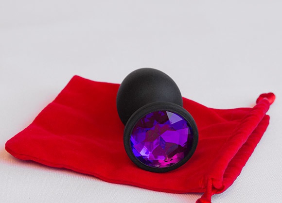 Черная силиконовая пробка с фиолетовым стразом